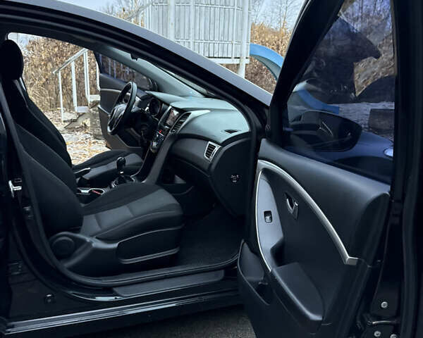 Черный Хендай i30, объемом двигателя 1.4 л и пробегом 200 тыс. км за 8500 $, фото 14 на Automoto.ua