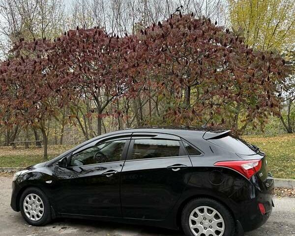 Черный Хендай i30, объемом двигателя 1.58 л и пробегом 110 тыс. км за 8500 $, фото 13 на Automoto.ua