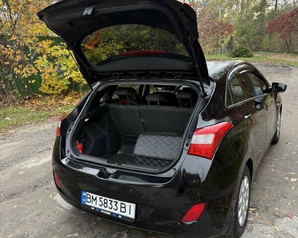 Черный Хендай i30, объемом двигателя 1.58 л и пробегом 110 тыс. км за 8500 $, фото 11 на Automoto.ua