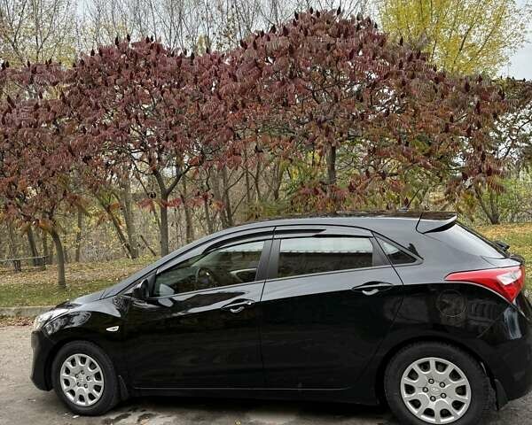 Черный Хендай i30, объемом двигателя 1.58 л и пробегом 110 тыс. км за 8500 $, фото 4 на Automoto.ua