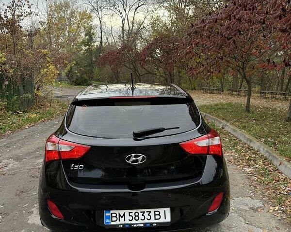 Черный Хендай i30, объемом двигателя 1.58 л и пробегом 110 тыс. км за 8500 $, фото 14 на Automoto.ua