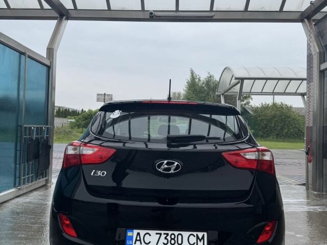Черный Хендай i30, объемом двигателя 1.4 л и пробегом 160 тыс. км за 8600 $, фото 3 на Automoto.ua