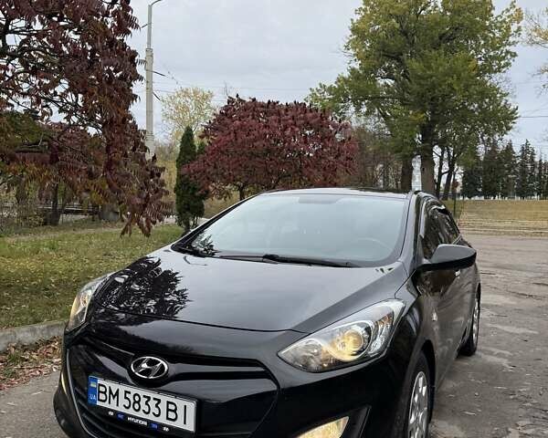 Черный Хендай i30, объемом двигателя 1.58 л и пробегом 110 тыс. км за 8500 $, фото 9 на Automoto.ua