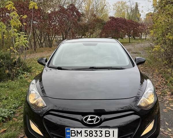 Черный Хендай i30, объемом двигателя 1.58 л и пробегом 110 тыс. км за 8500 $, фото 1 на Automoto.ua