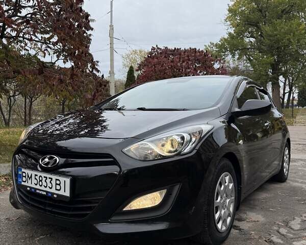 Черный Хендай i30, объемом двигателя 1.58 л и пробегом 110 тыс. км за 8500 $, фото 7 на Automoto.ua