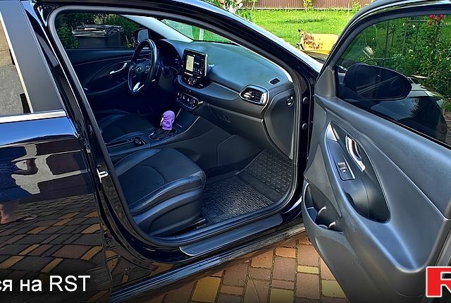 Черный Хендай i30, объемом двигателя 1.4 л и пробегом 97 тыс. км за 14500 $, фото 6 на Automoto.ua