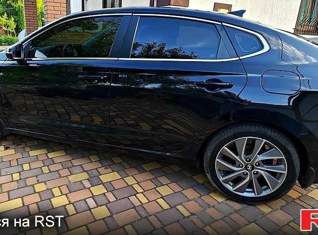 Черный Хендай i30, объемом двигателя 1.4 л и пробегом 97 тыс. км за 14500 $, фото 2 на Automoto.ua
