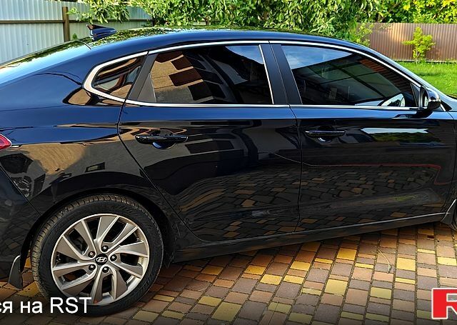 Черный Хендай i30, объемом двигателя 1.4 л и пробегом 97 тыс. км за 14500 $, фото 3 на Automoto.ua