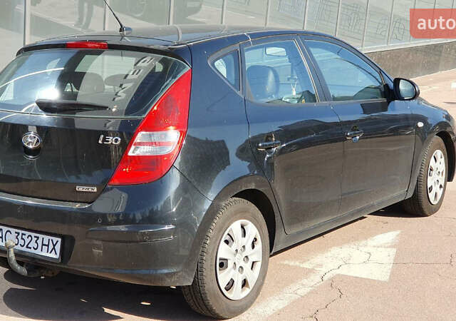 Черный Хендай i30, объемом двигателя 1.6 л и пробегом 228 тыс. км за 6200 $, фото 3 на Automoto.ua