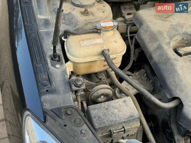 Черный Хендай i30, объемом двигателя 1.6 л и пробегом 223 тыс. км за 6000 $, фото 7 на Automoto.ua