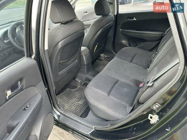 Чорний Хендай i30, об'ємом двигуна 1.58 л та пробігом 257 тис. км за 5650 $, фото 5 на Automoto.ua