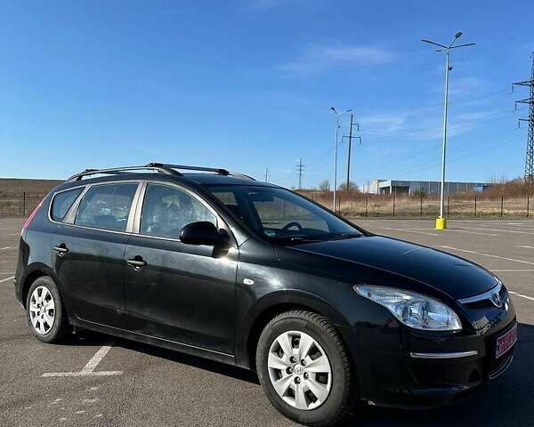 Черный Хендай i30, объемом двигателя 1.6 л и пробегом 194 тыс. км за 6750 $, фото 3 на Automoto.ua