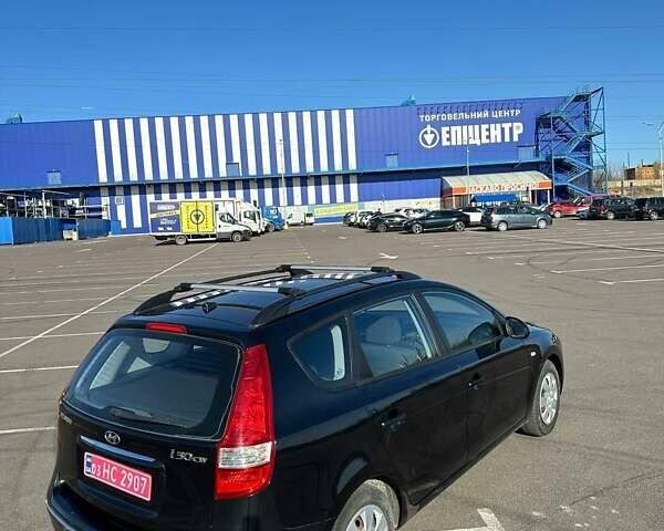 Черный Хендай i30, объемом двигателя 1.6 л и пробегом 194 тыс. км за 6750 $, фото 4 на Automoto.ua