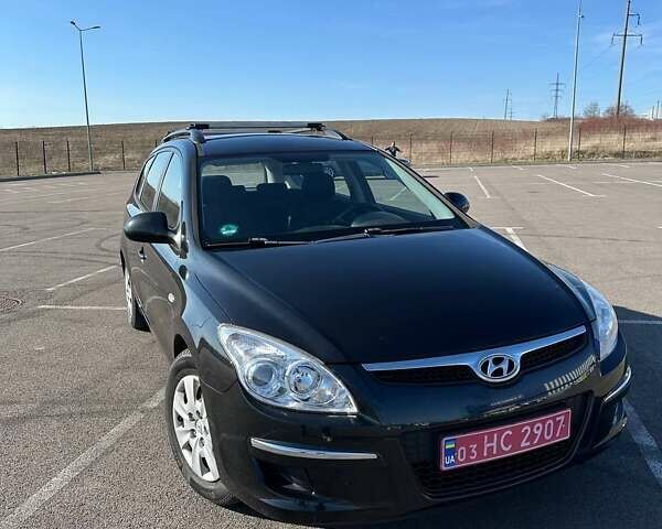 Черный Хендай i30, объемом двигателя 1.6 л и пробегом 194 тыс. км за 6750 $, фото 1 на Automoto.ua