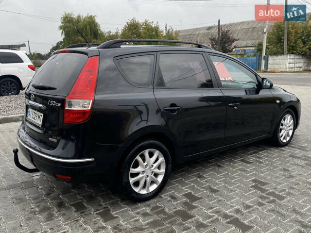 Черный Хендай i30, объемом двигателя 1.58 л и пробегом 341 тыс. км за 6200 $, фото 19 на Automoto.ua