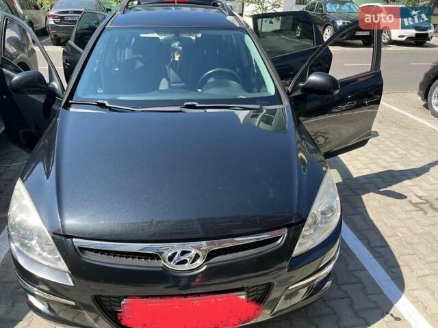 Черный Хендай i30, объемом двигателя 1.58 л и пробегом 234 тыс. км за 5650 $, фото 4 на Automoto.ua