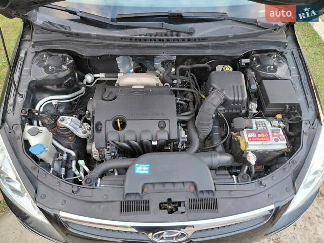 Черный Хендай i30, объемом двигателя 1.59 л и пробегом 198 тыс. км за 6400 $, фото 10 на Automoto.ua