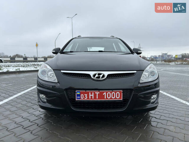 Черный Хендай i30, объемом двигателя 1.6 л и пробегом 169 тыс. км за 6150 $, фото 12 на Automoto.ua