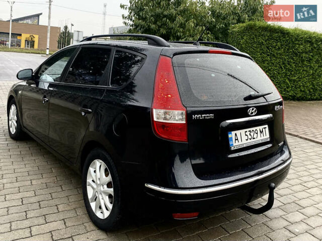 Черный Хендай i30, объемом двигателя 1.58 л и пробегом 341 тыс. км за 6200 $, фото 12 на Automoto.ua