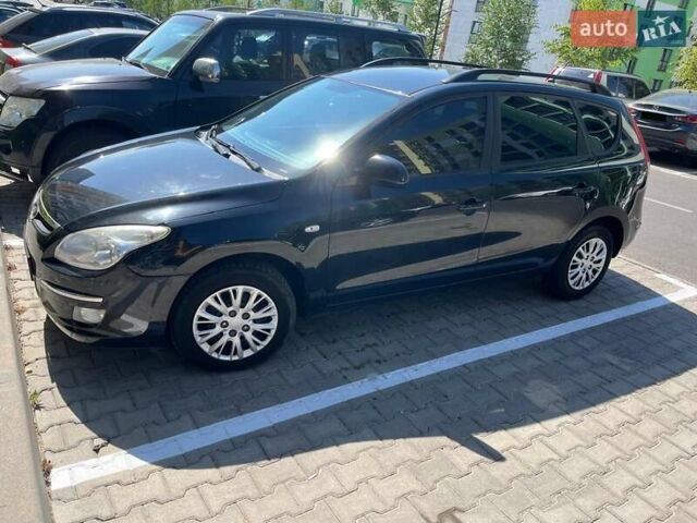 Черный Хендай i30, объемом двигателя 1.58 л и пробегом 234 тыс. км за 5650 $, фото 2 на Automoto.ua