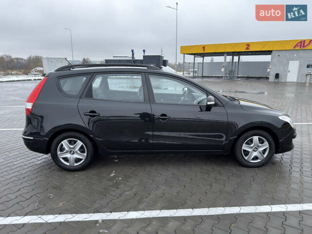 Черный Хендай i30, объемом двигателя 1.6 л и пробегом 169 тыс. км за 6150 $, фото 8 на Automoto.ua