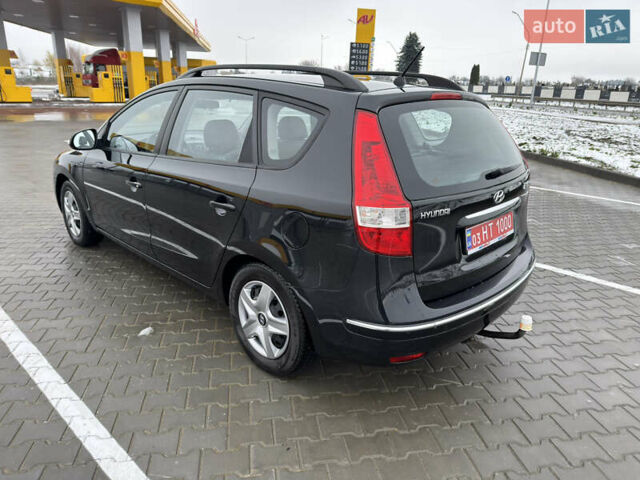 Черный Хендай i30, объемом двигателя 1.6 л и пробегом 169 тыс. км за 6150 $, фото 2 на Automoto.ua