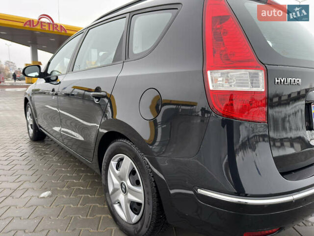 Черный Хендай i30, объемом двигателя 1.6 л и пробегом 169 тыс. км за 6150 $, фото 3 на Automoto.ua