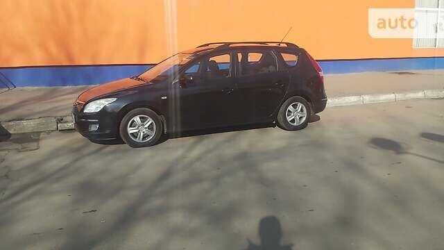 Чорний Хендай i30, об'ємом двигуна 1.6 л та пробігом 143 тис. км за 6800 $, фото 1 на Automoto.ua