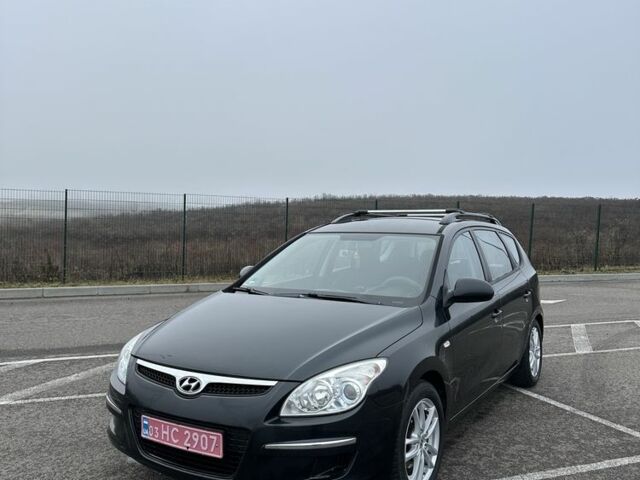 Черный Хендай i30, объемом двигателя 1.6 л и пробегом 216 тыс. км за 6550 $, фото 3 на Automoto.ua