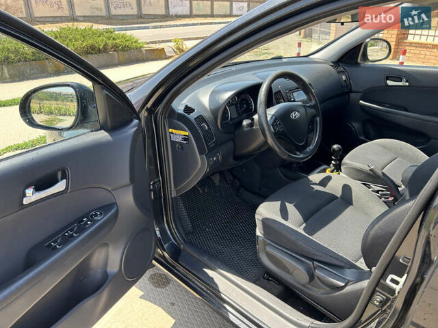 Черный Хендай i30, объемом двигателя 1.59 л и пробегом 226 тыс. км за 6500 $, фото 9 на Automoto.ua