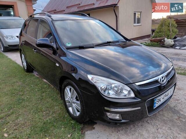 Черный Хендай i30, объемом двигателя 1.59 л и пробегом 198 тыс. км за 6400 $, фото 4 на Automoto.ua