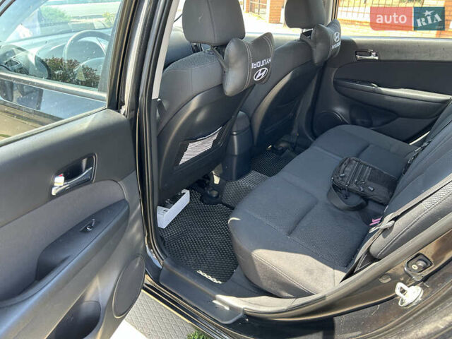 Черный Хендай i30, объемом двигателя 1.59 л и пробегом 226 тыс. км за 6500 $, фото 12 на Automoto.ua