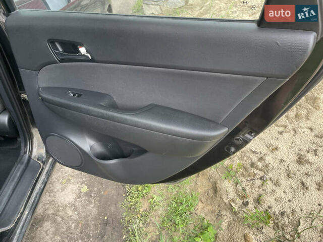 Черный Хендай i30, объемом двигателя 1.6 л и пробегом 324 тыс. км за 4900 $, фото 12 на Automoto.ua
