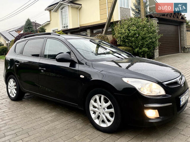 Черный Хендай i30, объемом двигателя 1.58 л и пробегом 341 тыс. км за 6200 $, фото 6 на Automoto.ua