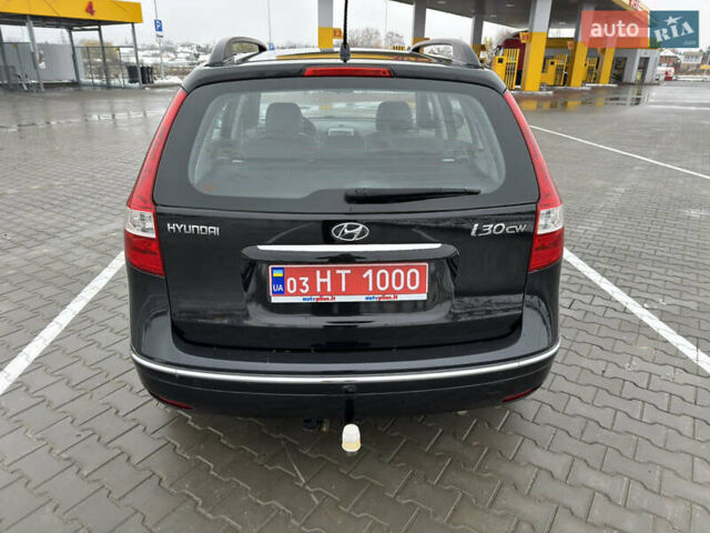 Черный Хендай i30, объемом двигателя 1.6 л и пробегом 169 тыс. км за 6150 $, фото 4 на Automoto.ua