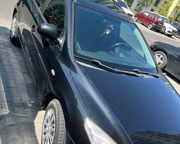 Черный Хендай i30, объемом двигателя 1.58 л и пробегом 234 тыс. км за 5650 $, фото 1 на Automoto.ua