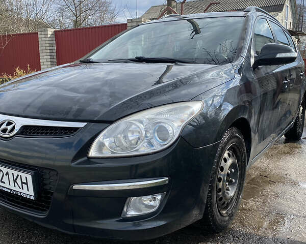 Черный Хендай i30, объемом двигателя 1.6 л и пробегом 324 тыс. км за 4900 $, фото 2 на Automoto.ua