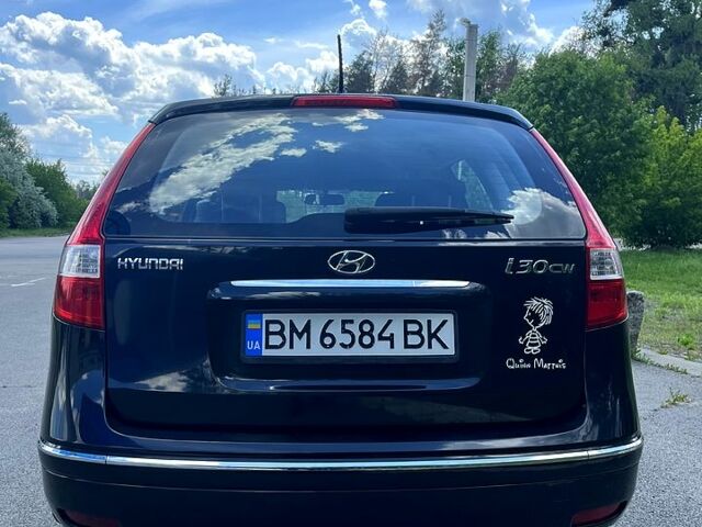 Черный Хендай i30, объемом двигателя 1.6 л и пробегом 198 тыс. км за 6800 $, фото 4 на Automoto.ua