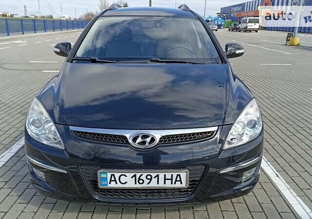 Черный Хендай i30, объемом двигателя 1.6 л и пробегом 181 тыс. км за 6600 $, фото 2 на Automoto.ua