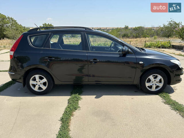 Черный Хендай i30, объемом двигателя 1.59 л и пробегом 226 тыс. км за 6500 $, фото 7 на Automoto.ua