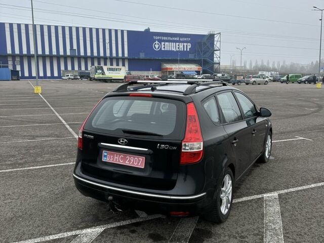 Черный Хендай i30, объемом двигателя 1.6 л и пробегом 216 тыс. км за 6550 $, фото 1 на Automoto.ua