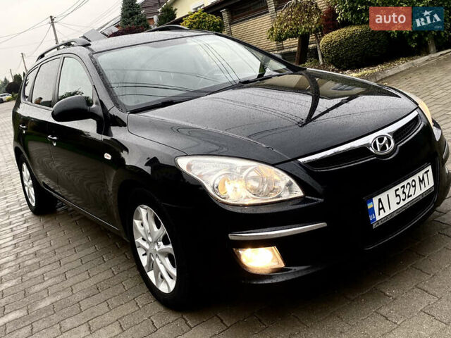 Черный Хендай i30, объемом двигателя 1.58 л и пробегом 341 тыс. км за 6200 $, фото 2 на Automoto.ua