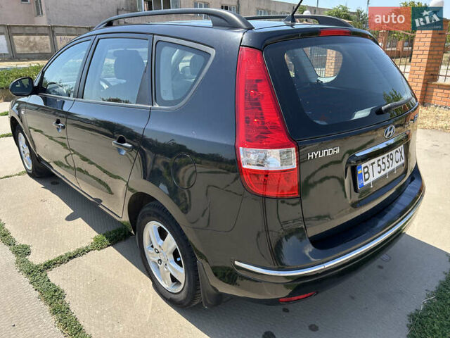 Черный Хендай i30, объемом двигателя 1.59 л и пробегом 226 тыс. км за 6500 $, фото 4 на Automoto.ua