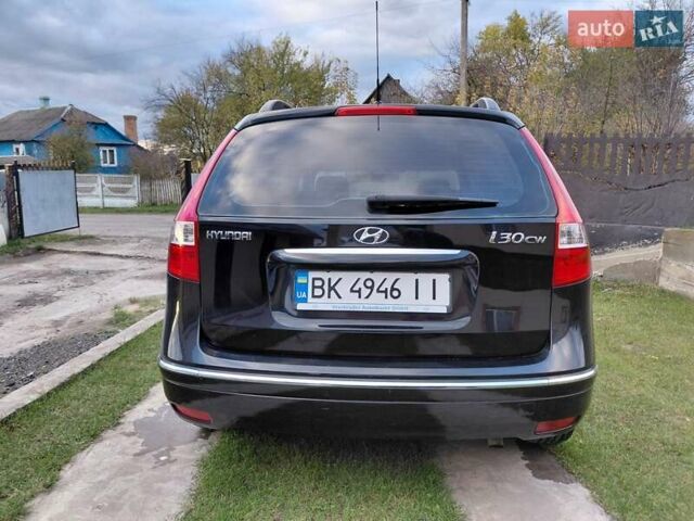 Черный Хендай i30, объемом двигателя 1.59 л и пробегом 198 тыс. км за 6400 $, фото 2 на Automoto.ua
