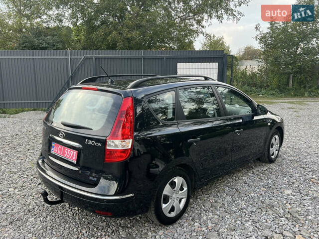 Чорний Хендай i30, об'ємом двигуна 1.4 л та пробігом 188 тис. км за 6850 $, фото 6 на Automoto.ua