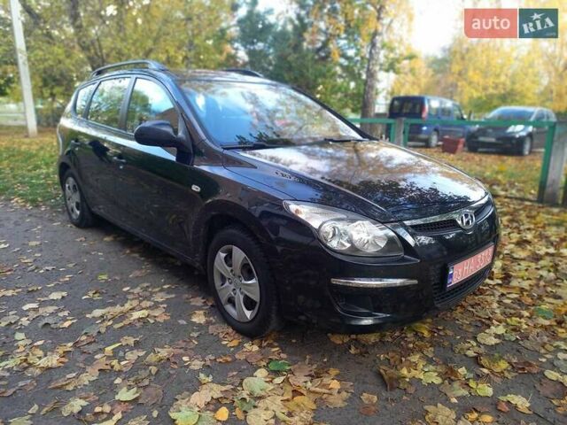 Хендай i30 2009 у Черкасах на Automoto.ua Чорний Хендай i30, об'ємом двигуна 1.4 л та пробігом 188 тис. км за 6150 $, фото 7 на Automoto.ua