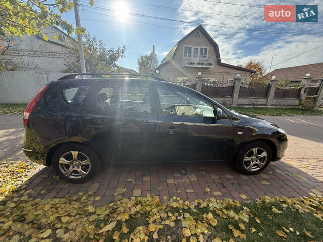 Хендай i30 2009 в Борисполе на Automoto.ua Черный Хендай i30, объемом двигателя 1.4 л и пробегом 146 тыс. км за 6800 $, фото 6 на Automoto.ua