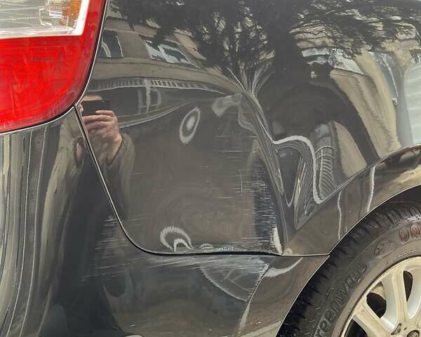 Чорний Хендай i30, об'ємом двигуна 1.4 л та пробігом 174 тис. км за 6000 $, фото 7 на Automoto.ua