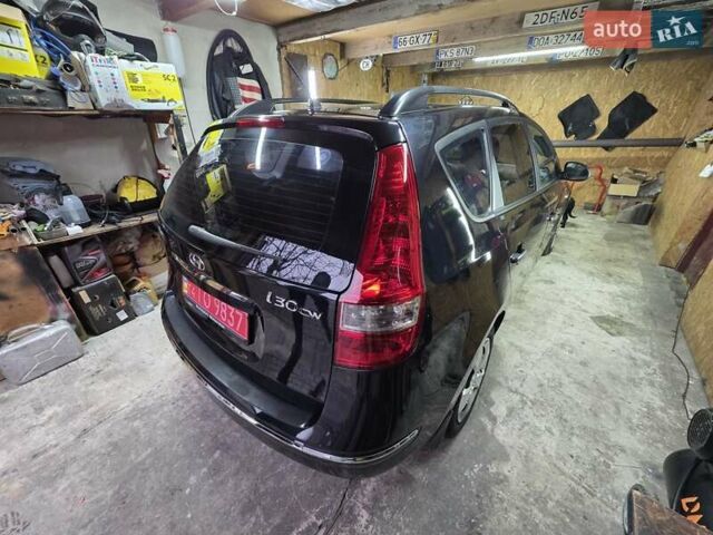 Чорний Хендай i30, об'ємом двигуна 1.6 л та пробігом 231 тис. км за 5600 $, фото 2 на Automoto.ua