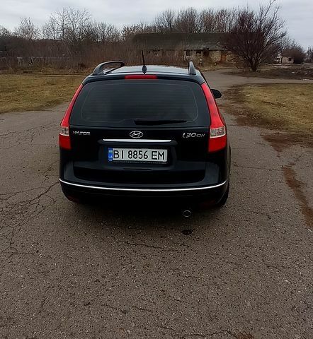 Чорний Хендай i30, об'ємом двигуна 1.4 л та пробігом 151 тис. км за 6700 $, фото 7 на Automoto.ua